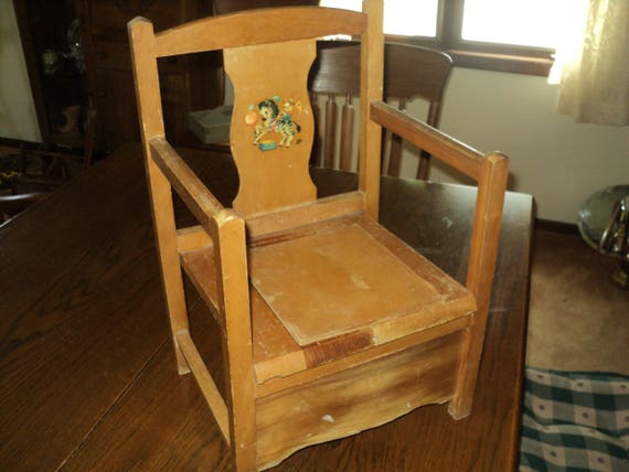 Antique Wooden Potty Chair Value  . Still Strong And Sturdy, Traces Of It�s Original White Paint Remain Scattered Over A Surface That Has Primarily Worn Down To The Adjustable Back And Leg Rest, The Chair Folds For Easy Storing.