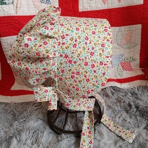 Girls  Pioneer bonnet.. ."Please read full details on sizing and shipping inside of ad"