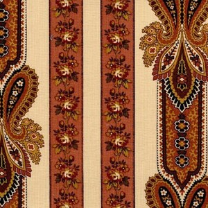 May include: A vintage fabric with a repeating pattern of paisley motifs and floral designs in shades of brown, orange, and white on a cream background.