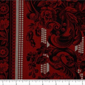 May include: Red fabric with a black and white patterned design. The pattern features a repeating floral motif with intricate details. The fabric has a textured surface.