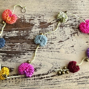 Knitted puffy heart hanging garland with bells image 9