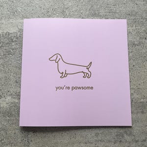 Tarjeta de felicitación con el texto "Eres increíble" de Dachshund