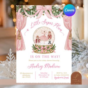 Könnte beinhalten: Eine Babyparty-Einladung mit einer Schneekugel, die eine Ballerina und einen Nussknacker zeigt, umrahmt von rosa Vorhängen und Tannengrün. Der Text lautet: A Little Sugar Plum IS ON THE WAY! Please join us for a baby shower honoring Audrey Madison, Saturday December 12 at 1:00 pm, 23 downtown st oklahoma okc 23123, RSVP by 12/2 to Cathy 232322334, Registered at Target.