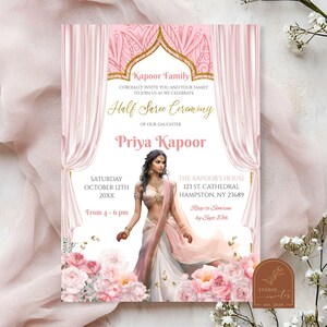 May include: A pink and gold invitation for a Half Saree Ceremony for Priya Kapoor. The invitation features a pink and gold ornate archway with a floral design. The text on the invitation reads "Kapoor Family" and "Half Saree Ceremony". The invitation also includes a photo of Priya Kapoor in a pink and gold saree.