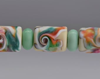 Ensemble de perles tonneau en verre au chalumeau vert pâle mat, orange, pêche par Sky Valley Beads