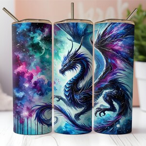 May include: Three stainless steel tumblers with a galaxy background and a blue dragon design. The dragon is depicted in a watercolor style with purple and blue hues.