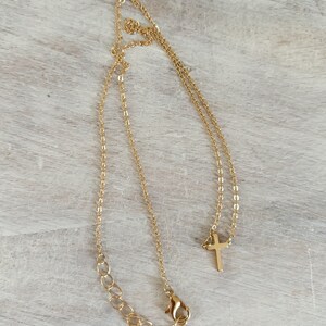 Gold cross necklace