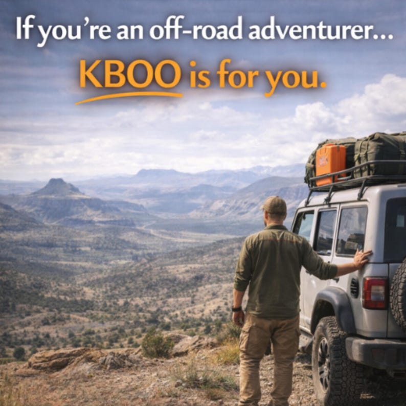 May include: A person stands next to a silver off-road vehicle with gear on the roof, overlooking a mountainous landscape. The text "If you're an off-road adventurer... KBOO is for you" is displayed in the upper portion of the image.