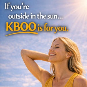 May include: A woman smiles with her eyes closed, reaching up towards the sun. The sky is blue with some clouds. Text in the image reads: "If you're outside in the sun... KBOO is for you."