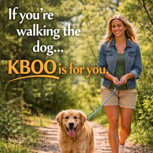 May include: A woman walking a golden retriever on a path in a park. The dog is on a blue leash. The text "If you're walking the dog... KBOO is for you" is in the upper left corner.