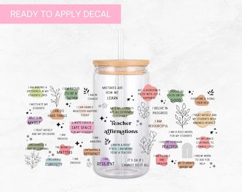 May include: A clear glass tumbler with a bamboo lid and a straw. The tumbler is decorated with black and white illustrations of flowers and inspirational quotes for teachers. The quotes include "I am making a difference in my students' lives", "I am proud to be a teacher", "I can do hard things", "I am enough", "The work I do matters", "I am resilient", "Mistakes are how we learn", "Me & my students are all extremely capable", "Teacher affirmations", "My classroom is filled with joy & happiness", "I believe in progress", "I am resourceful", "I choose to focus on the good", "Everyone is doing their best", "I treat myself and my students with kindness respect", "I am a role model for my students", "I choose to remain peaceful", "I am flexible and creative", "My influence continues to change lives", "I know when to ask for help", "My students inspire me".