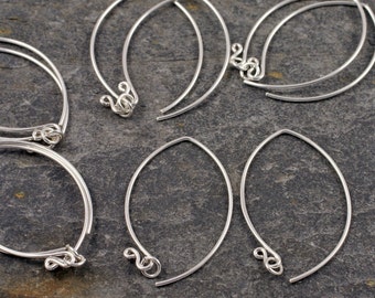 five pairs of handmade ethical sterling silver long wishbone earwires