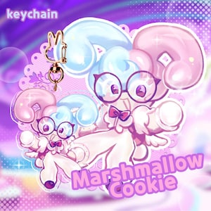 May include: A keychain featuring a cartoon character with pink and blue hair, glasses, and a bow tie. The text "Marshmallow Cookie" is displayed on the bottom right. The keychain has a gold-colored bunny-shaped clasp.