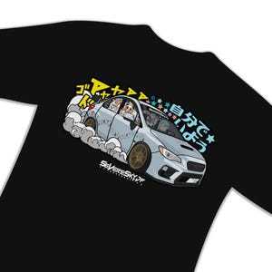 May include: A black t-shirt with a cartoon illustration of a silver Subaru WRX with a group of anime characters inside. The car is driving fast and leaving a trail of smoke. The text "SevereSkyJP" is printed below the car. The Japanese text on the shirt reads "Go for it!" and "Yeah!"