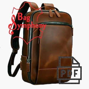 Puede incluir: Una mochila de cuero marrón con cremalleras negras y una correa negra. La mochila tiene un compartimento principal grande y un bolsillo frontal más pequeño. La mochila está hecha de cuero de alta calidad y es perfecta para el uso diario.