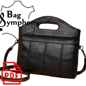 Könnte beinhalten: Schwarze Ledertasche mit einem oberen Henkel und einem langen verstellbaren Riemen. Die Tasche hat ein gestepptes Design und einen Klappenverschluss.