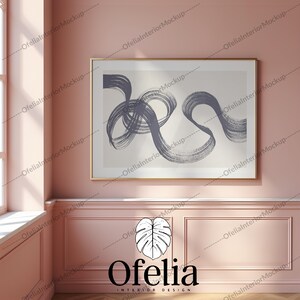 May include: A framed abstract painting with a gray and white color scheme hangs on a pink wall. The painting features a series of swirling lines and curves. The wall is decorated with white wainscoting and a light wood floor. The text "Ofelia INTERIOR DESIGN" is visible at the bottom of the image.