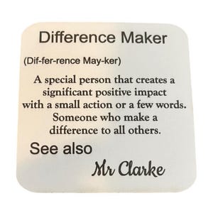 May include: A white, square card with rounded corners. The card has the words "Difference Maker" in a bold, black font, along with a definition and the name "Mr Clarke" at the bottom.