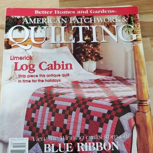 May include: The cover of American Patchwork & Quilting magazine features a quilt with a red, black, and purple pattern. The magazine's title is in large white letters, with the headline "Limerick Log Cabin". The magazine is dated December 2001.