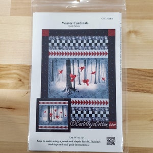 May include: A quilt pattern titled "Winter Cardinals" in a plastic sleeve. The design features a winter forest scene with red cardinals. The pattern includes instructions for a 54" by 72" lap quilt and wall quilt.