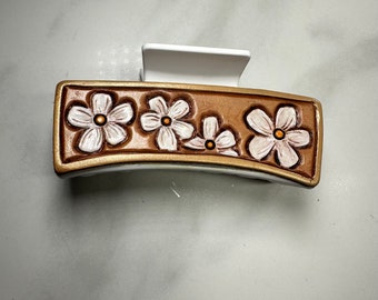 Hair claw clip with hand tooled daisy leather patches. Hand painted and one of a kind hair accessory is a great Christmas stocking stuffer