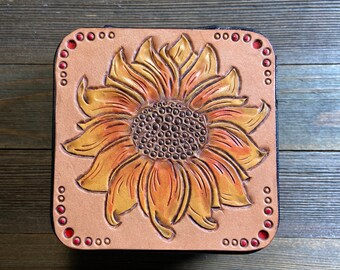 Tooled leather sunflower or prickly pear blooms on zippered travel jewelry case