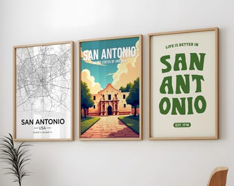 May include: Three framed prints with a San Antonio theme. The left print features a black and white map of San Antonio, Texas. The middle print features a colorful illustration of the Alamo, a historic mission in San Antonio. The right print features the text "LIFE IS BETTER IN SAN ANTONIO" in green letters on a cream background.