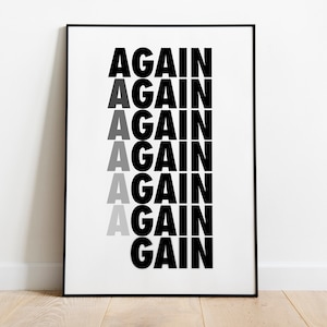 Peut inclure: Impression typographique en noir et blanc avec le mot "AGAIN" r&eacute;p&eacute;t&eacute; six fois, le premier "A" de chaque mot passant du noir au gris.