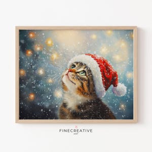 May include: A brown tabby cat wearing a red Santa hat looks up at a snowy sky with twinkling lights. The cat has green eyes and a white chest.