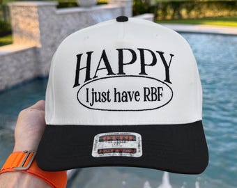 May include: A black and white baseball cap with the word "HAPPY" embroidered in black above the phrase "I just have RBF". The hat has a black brim and a black button on top.