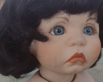 Black hair doll wig. Size 12-13