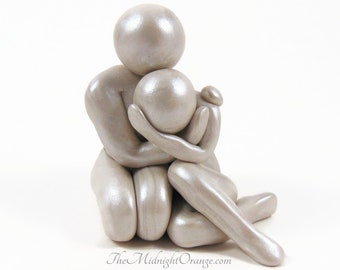 Gift of Comfort - supportive embrace Hug sculpture by The Midnight Orange