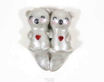 Significant Otters Holding Hands - clay animal sculpture - I Love You gift for anniversary or adorable wedding cake topper