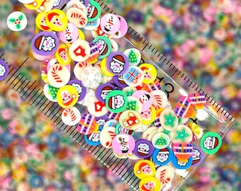 Mezcla de arcilla polimérica con círculos decorativos de temática navideña (NO COMESTIBLE) D23-16