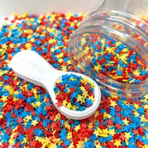 Mezcla de espolvoreo de arcilla polimérica en forma de estrellas rojas, azules y amarillas de 5 mm (NO COMESTIBLE) D28-28