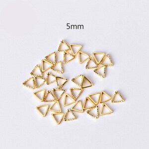 5 mm driehoekige gouden mini-ring met open achterkant