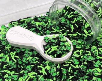 Mezcla de arcilla polimérica para espolvorear con diseño de extraterrestre verde y negro falso (no comestible) D6-36