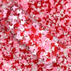 Borboleta falsa de 5 mm rosa vermelha e branca, Anima; Polímero granulado (NÃO COMESTÍVEL) D34-18