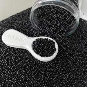 Mezcla de perlas negras de 2 mm (NO COMESTIBLE) D48-02