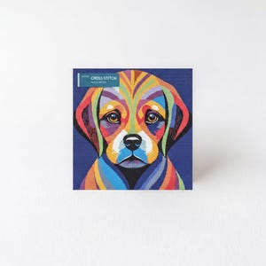 A colorful, abstract illustration of a dog's face, featuring vibrant shades of blue, yellow, orange, and red.