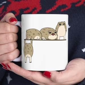 May include: A distressed wooden sign with the words "Welcome to our home" in white lettering. The sign has a rustic finish, ideal for adding a welcoming touch to any home's entrance.