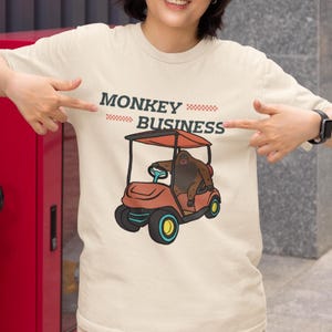 Orangutan Golf Cart Unisex T-Shirt, Orangutan Driving Golf Cart Meme Tee, Orangutan Shirt, Orangutan Meme, Orangutan Lover, Monkey Business