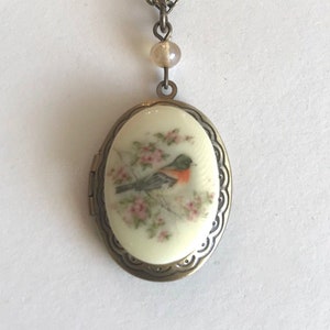 Spring robin necklace, bird locket necklace, bird with cherry blossoms, oval brass locket, vintage style Victorian locket, unique gift