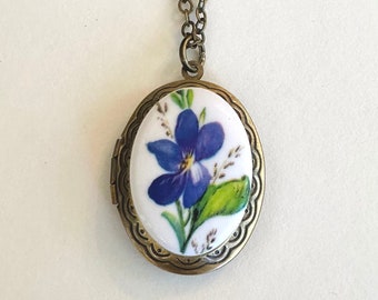Blue violet locket necklace, oval brass locket, wildflower necklace, unique gift for mom, keepsake jewelry, gift for her, spring flowers