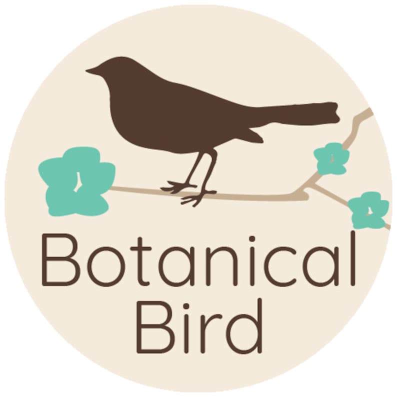 May include: A circular logo featuring a brown bird perched on a branch with teal flowers. The words "Botanical Bird" are written in brown below the bird and branch, set against a cream-colored background.