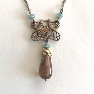 Vintage Brass Bird Necklace: Art Nouveau Filigree Pendant, Czech Glass Bead