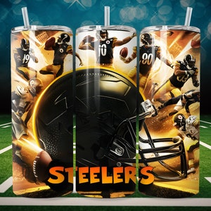 May include: A stainless steel tumbler with a black and gold design featuring Pittsburgh Steelers players and a football helmet. The tumbler has the word "STEELERS" printed on it.