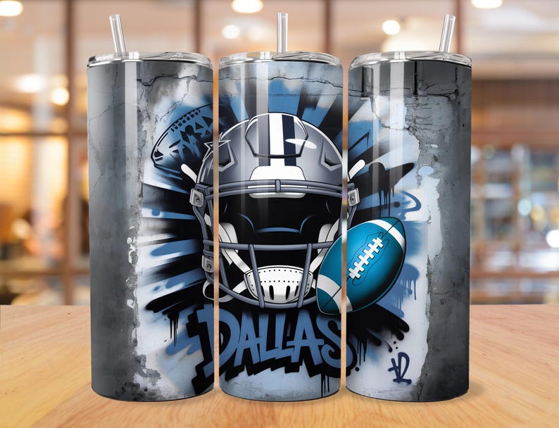 May include: Three stainless steel insulated tumblers with a football theme. Each tumbler features a football helmet, football, and the word "DALLAS" in a graffiti style design. The background has a distressed, textured look with shades of gray and blue.
