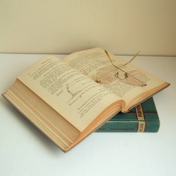 vintage spectacles and school books