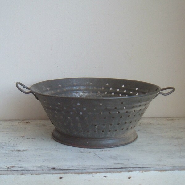 vintage primitive metal colander